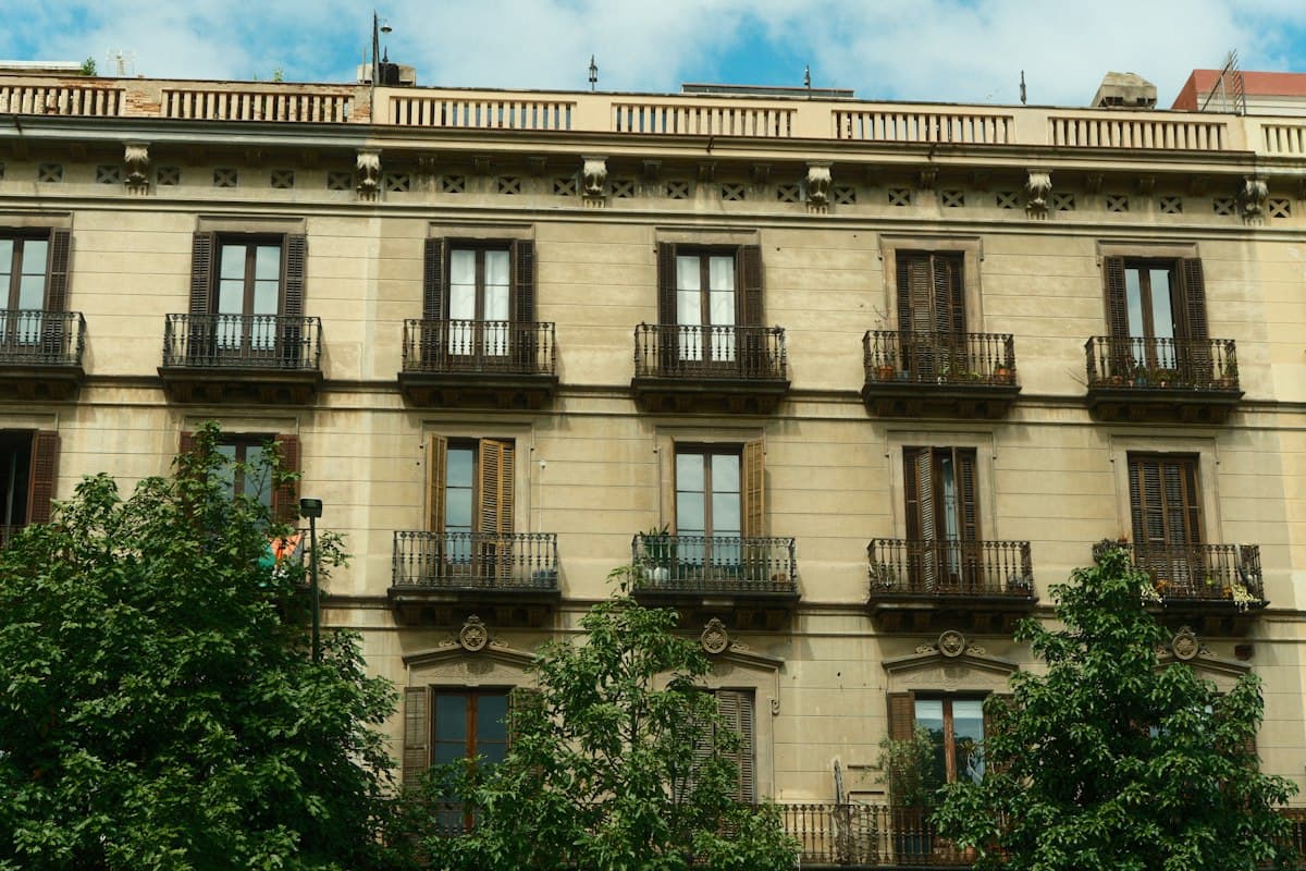 Historic building facade with balconies (illustrative photo)